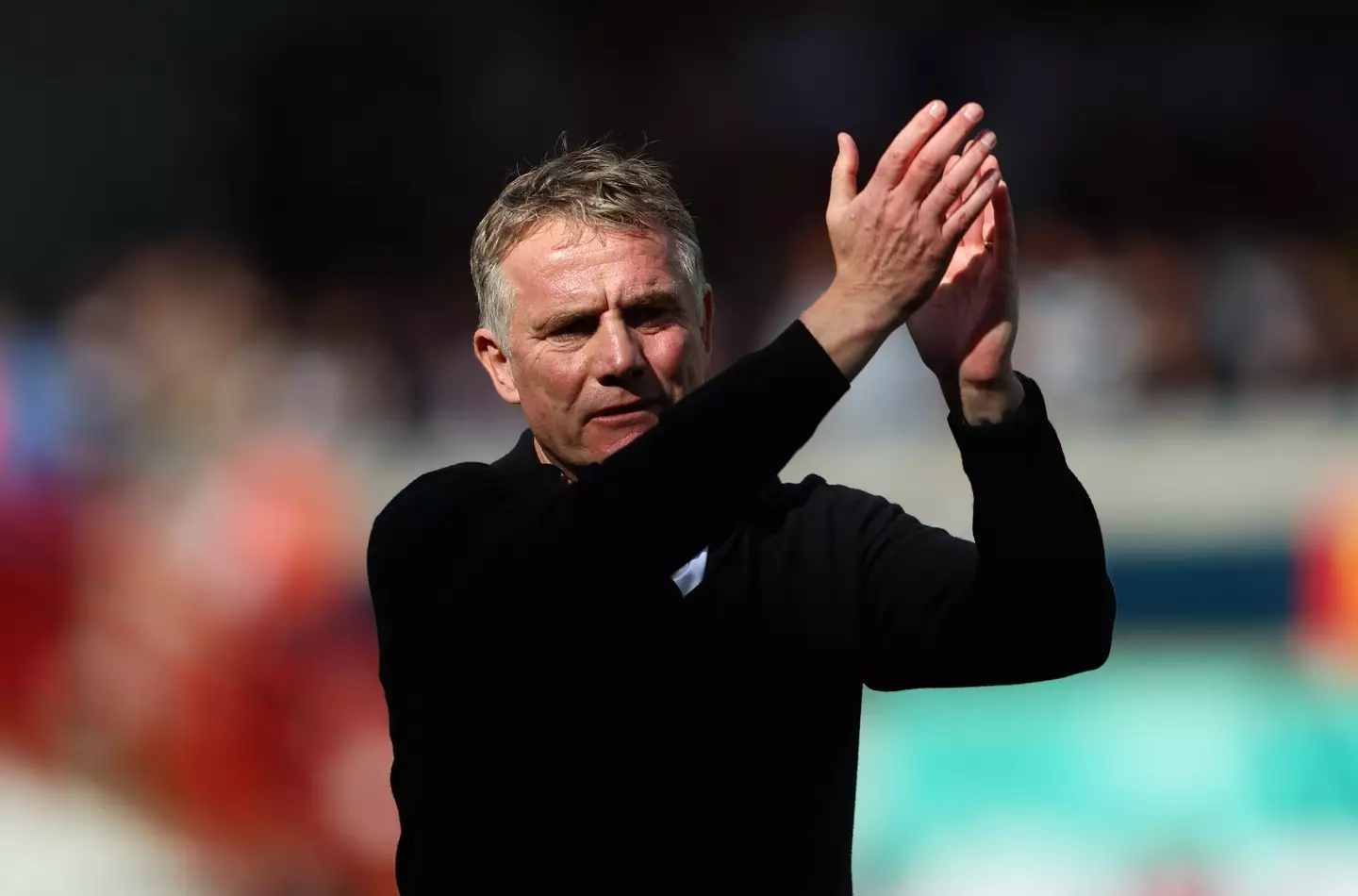 Phil Parkinson applauds the fans. Image: Cameron Smith / Stringer via Getty