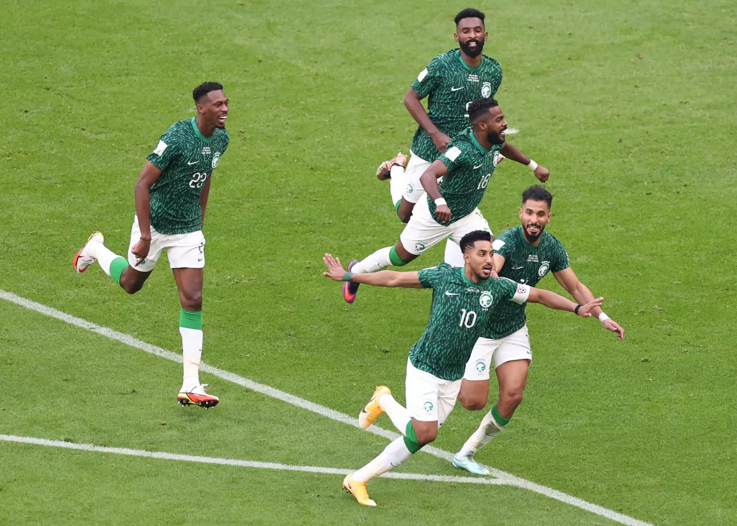 Al-Dawsari and other Saudi players celebrate his winner. (Image