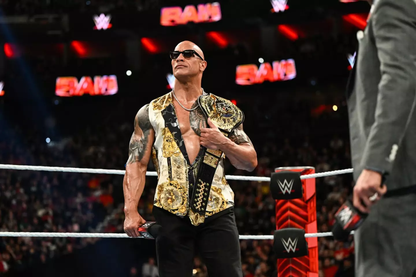The Rock pictured with the honorary 'People's Champion' belt in 2024 - Getty