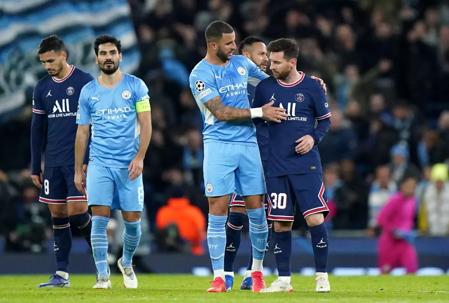 Kyle Walker and Lionel Messi embrace after a Champions League encounter. Image: Alamy
