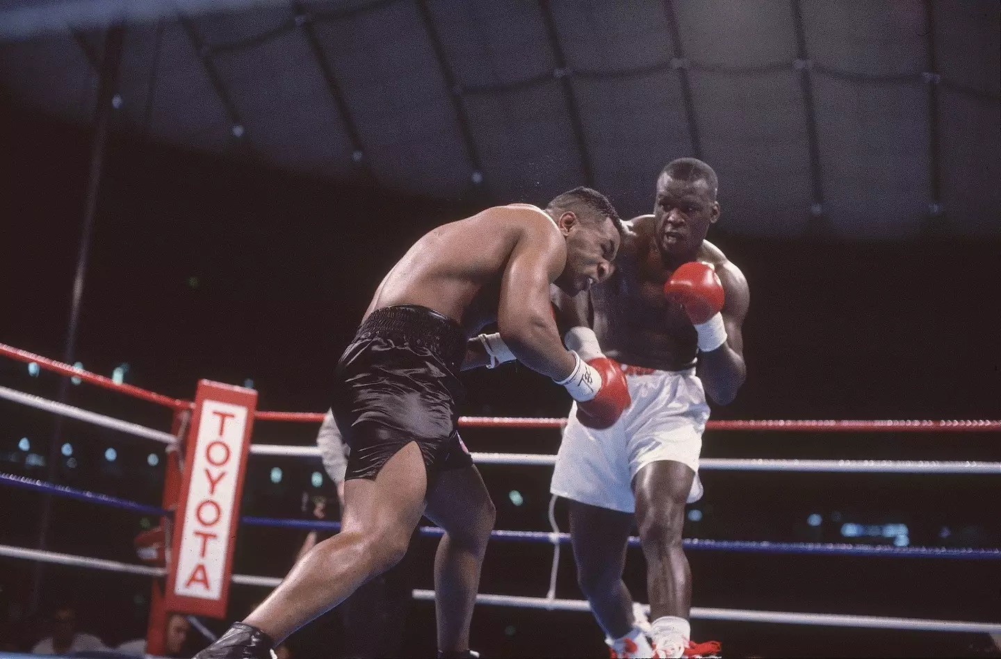 Mike Tyson and Buster Douglas during their heavyweight showdown. Image: Getty