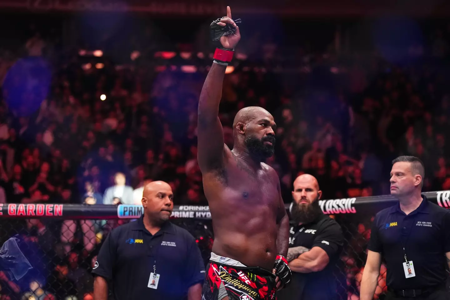 Jon Jones celebrates after beating Stipe Miocic at UFC 309. Image: Getty