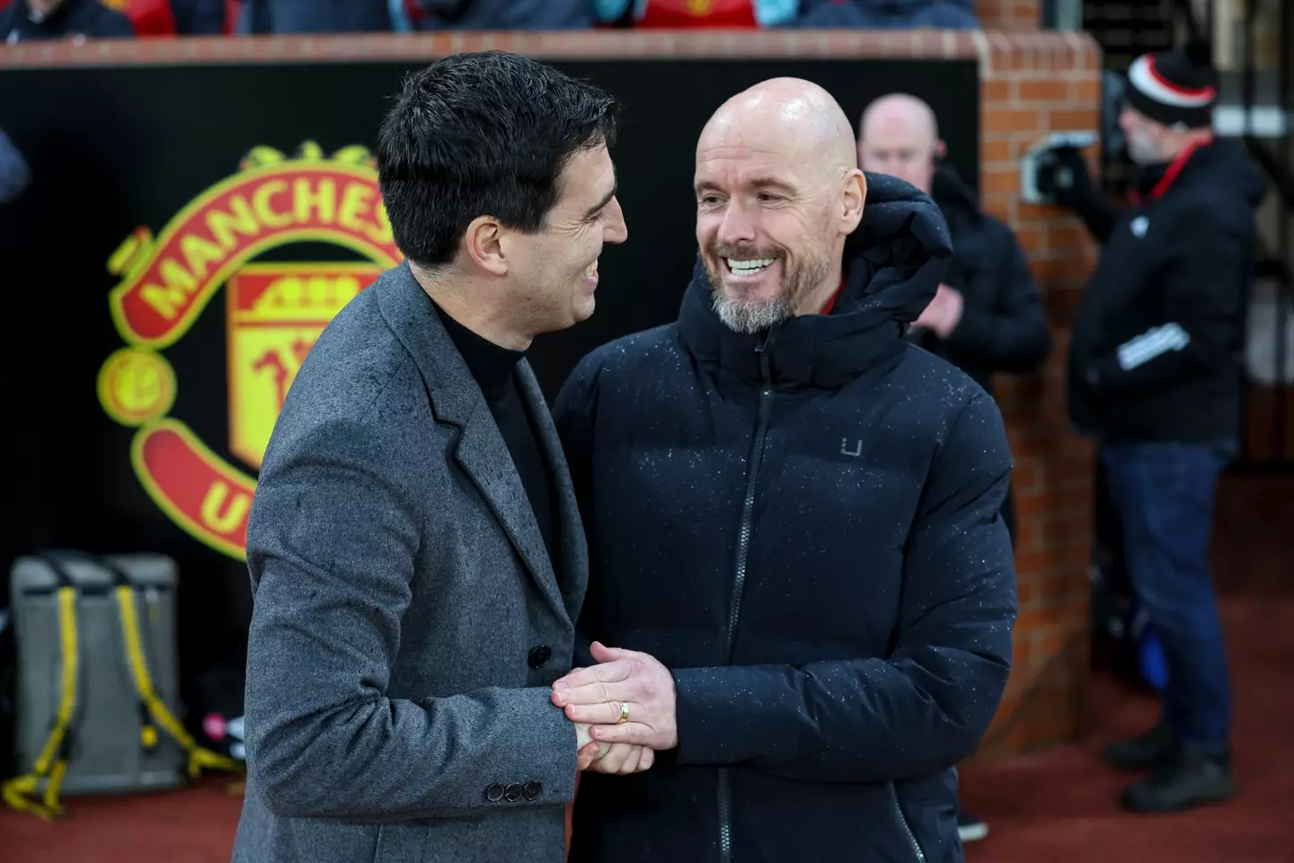 Andoni Iraola and Erik ten Hag embrace before kick-off. Image: Getty