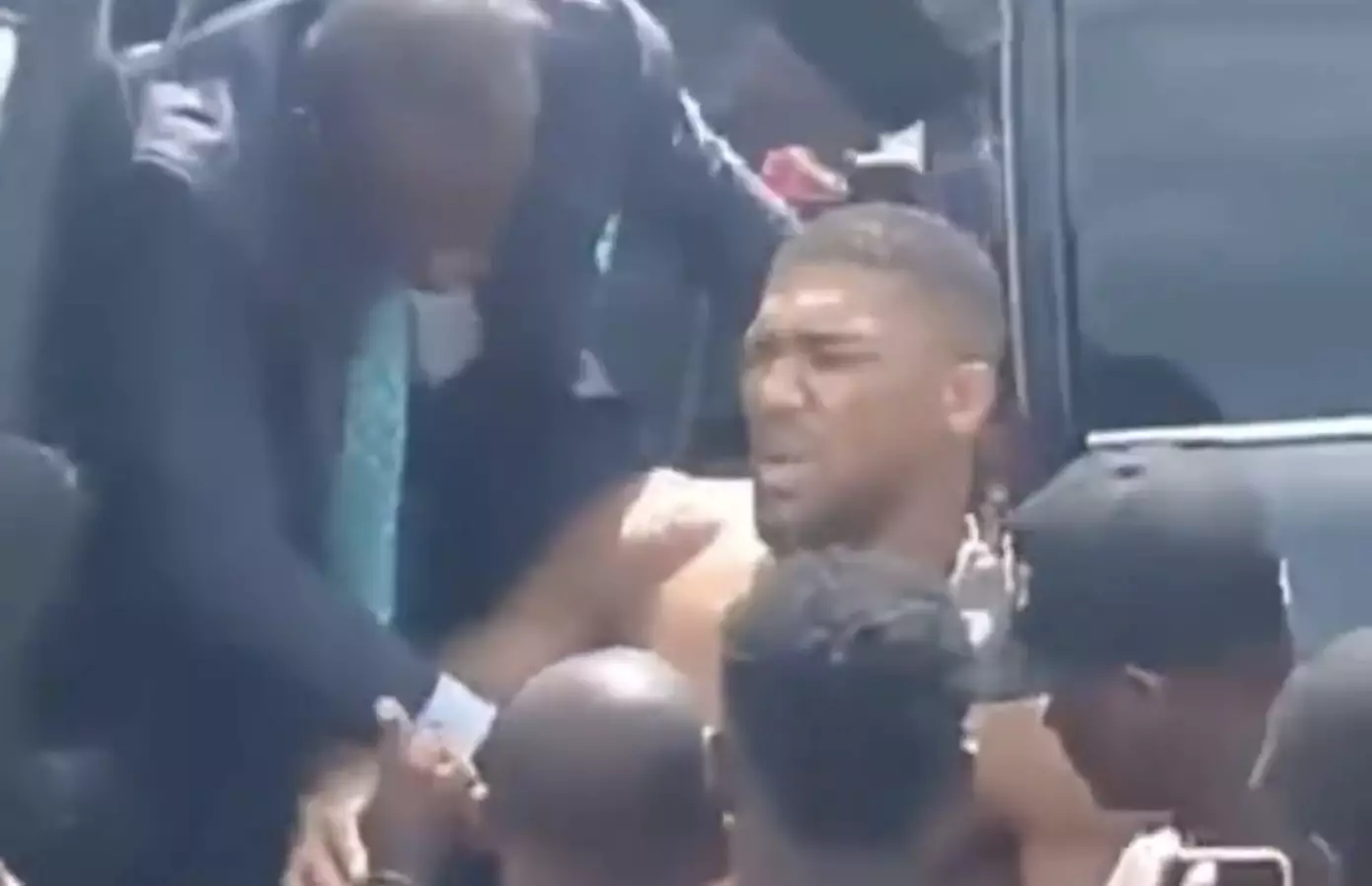 Joshua was pulled out of the car by rescuers (Image: Twitter)