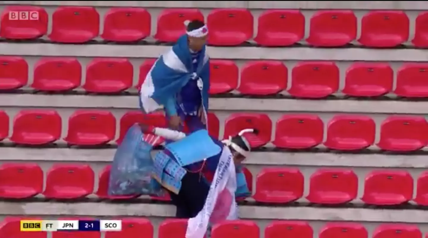 Japan fans tidy stadium during Women's World Cup. Image credit: BBC