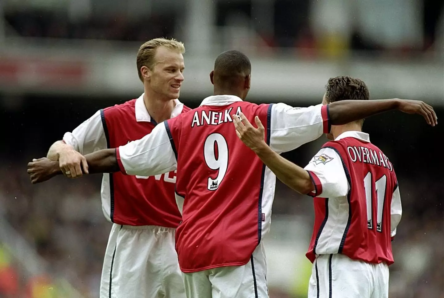 Marc Overmars, Nicolas Anelka and Dennis Bergkamp in action for Arsenal -