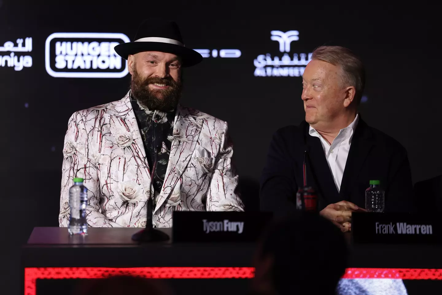 Frank Warren alongside Tyson Fury for a press conference. Image: Getty
