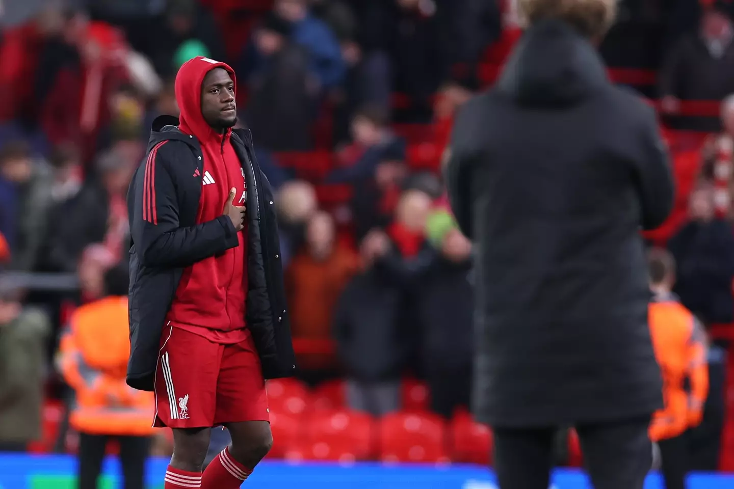 Ibrahima Konate cuts a dejected figure after Liverpool's defeat to PSV Eindhoven. Image: Getty