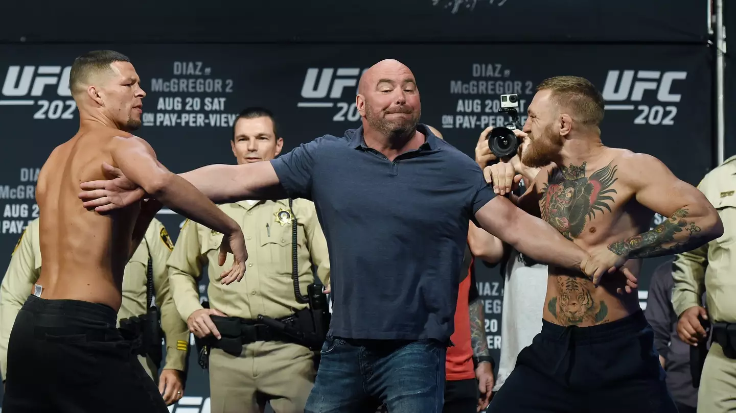 Dana White intervenes as Conor McGregor and Nate Diaz face off. Image: Getty