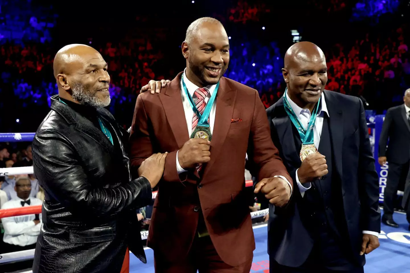Mike Tyson, Lennox Lewis and Evander Holyfield pictured (Image: Getty)