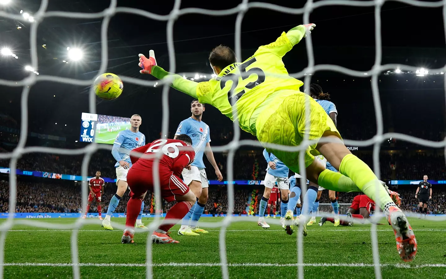 Robertson ducked out of the way of Van Dijk's header. Image credit: Getty