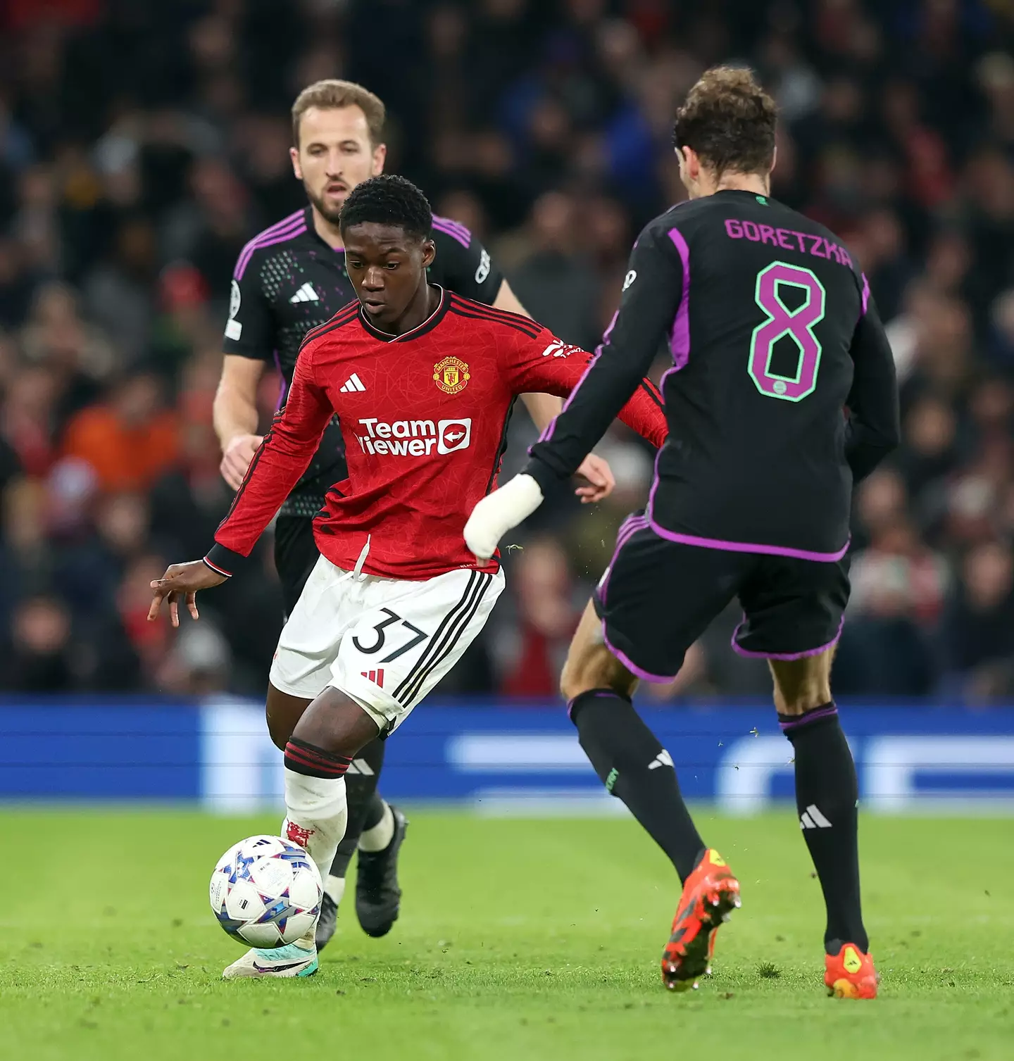 Kobbie Mainoo in action for Man Utd against Bayern Munich (