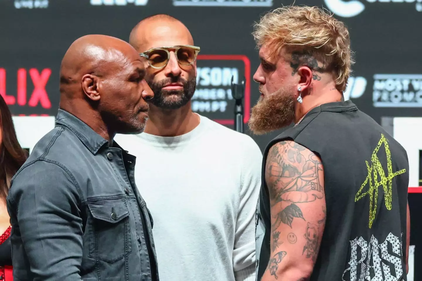 Mike Tyson and Jake Paul face off before their fight (Image: Getty)