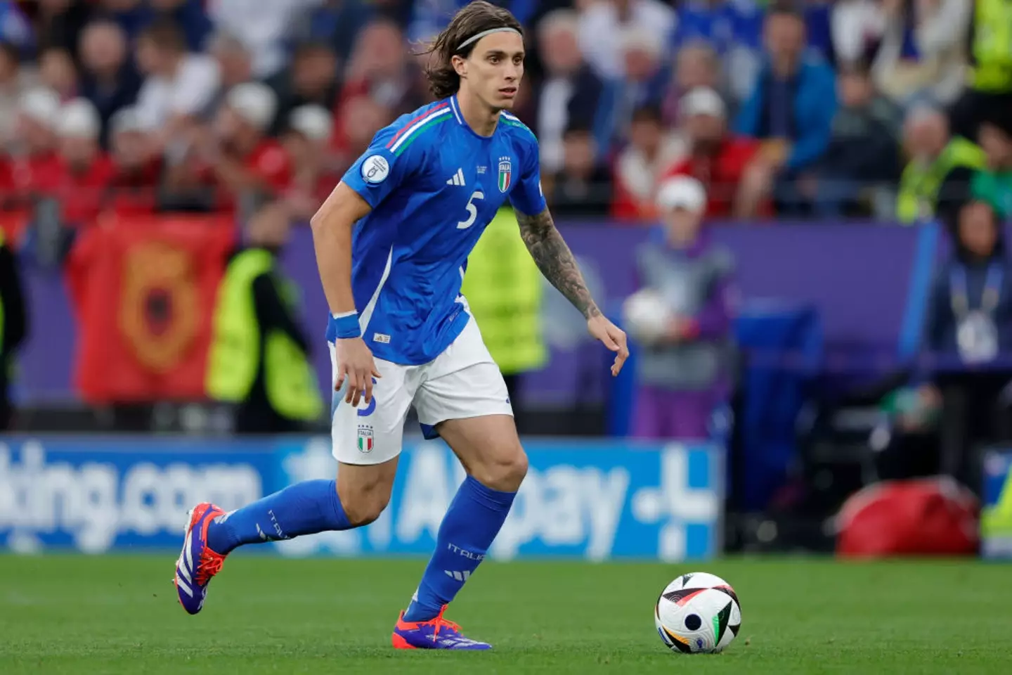 Italy's Riccardo Calafiori in action against Albania at Euro 2024 (