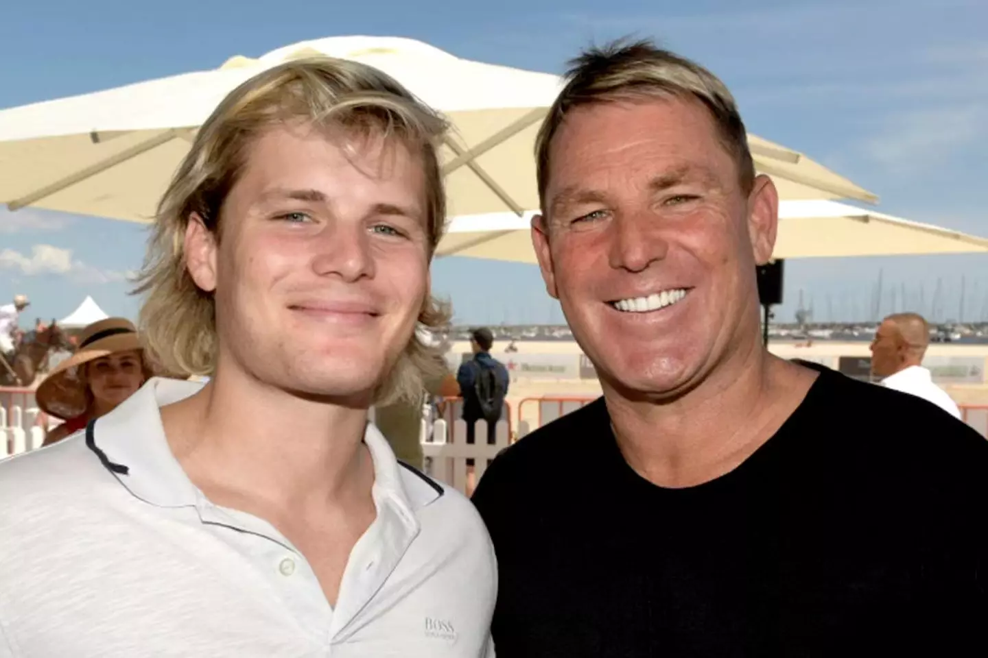 Shane Warne (right) with his son Jackson (Image: Getty)