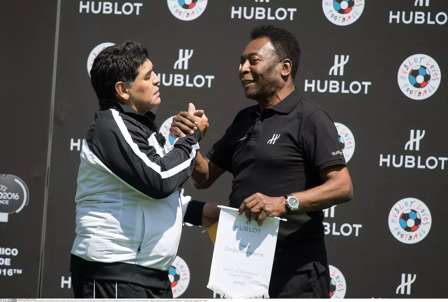 Maradona and Pele share the stage in 2016. Image: Alamy
