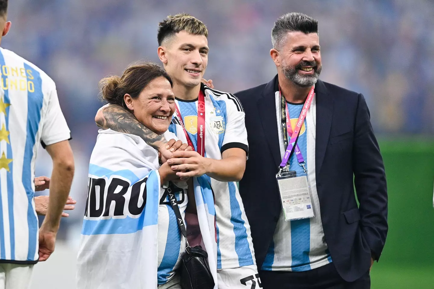 Martinez with his mother at full-time. (Image