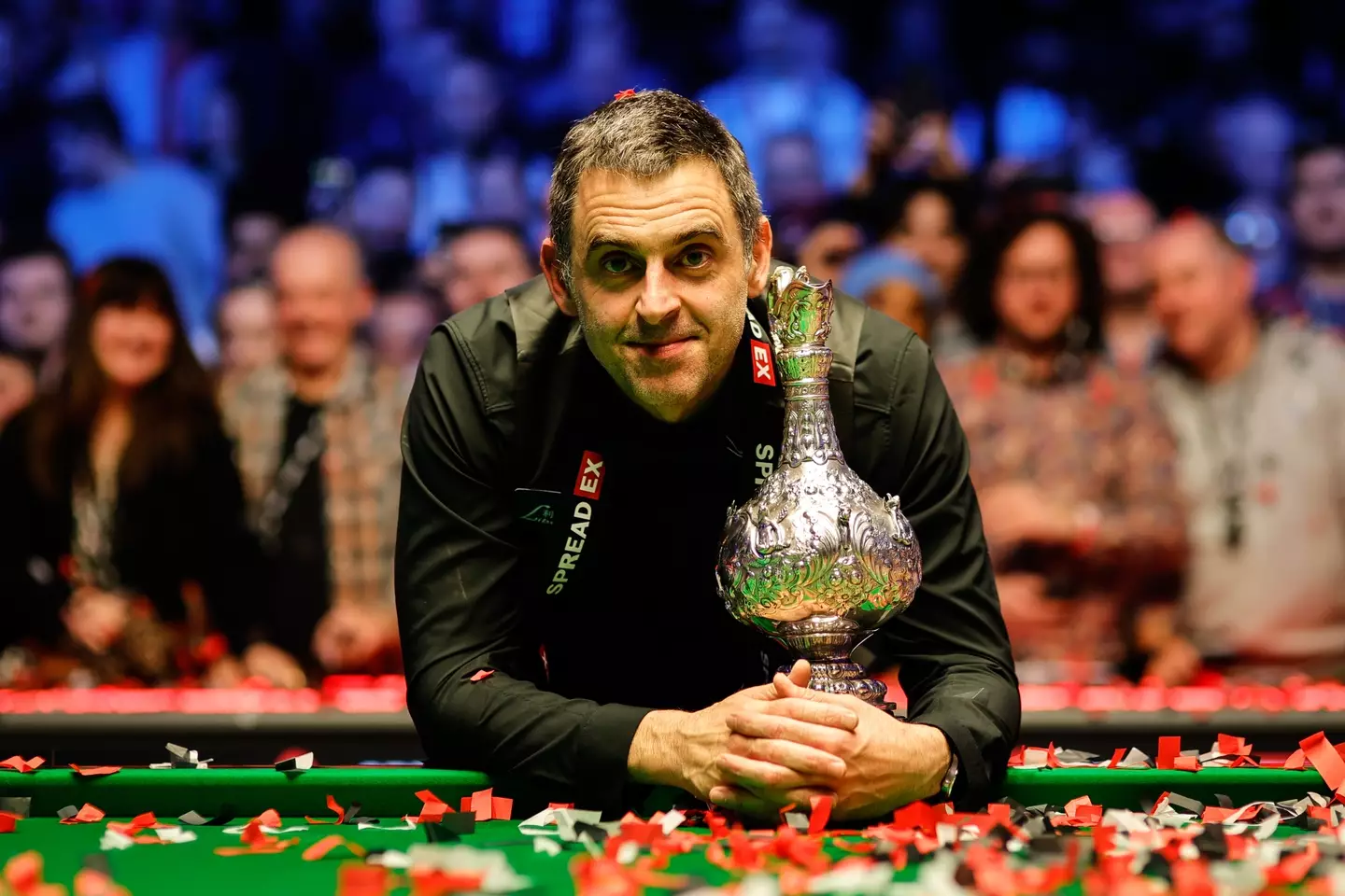 Ronnie O'Sullivan poses with the trophy after beating Judd Trump. Image: Getty 