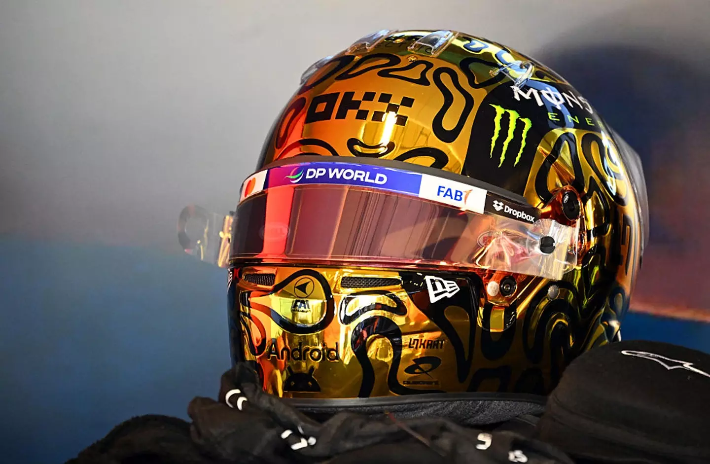 Lando Norris wore a gold championship helmet during testing after the Ahu Dhabi GP. (Image: Mark Sutton - Formula 1/Formula 1 via Getty Images)