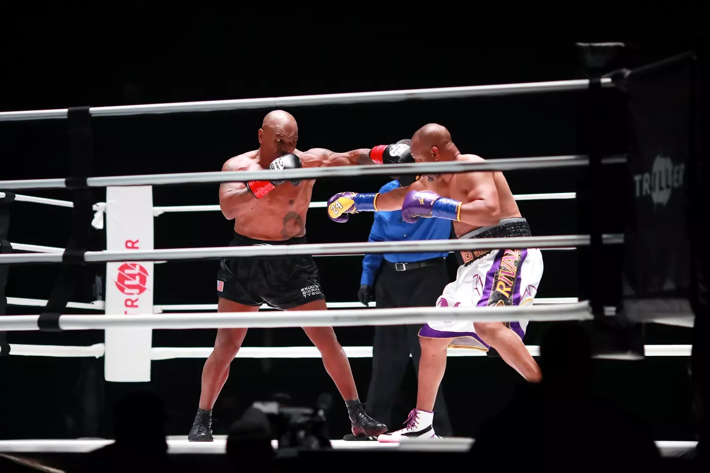 Mike Tyson and Roy Jones Jr during their exhibition bout. Image: Getty