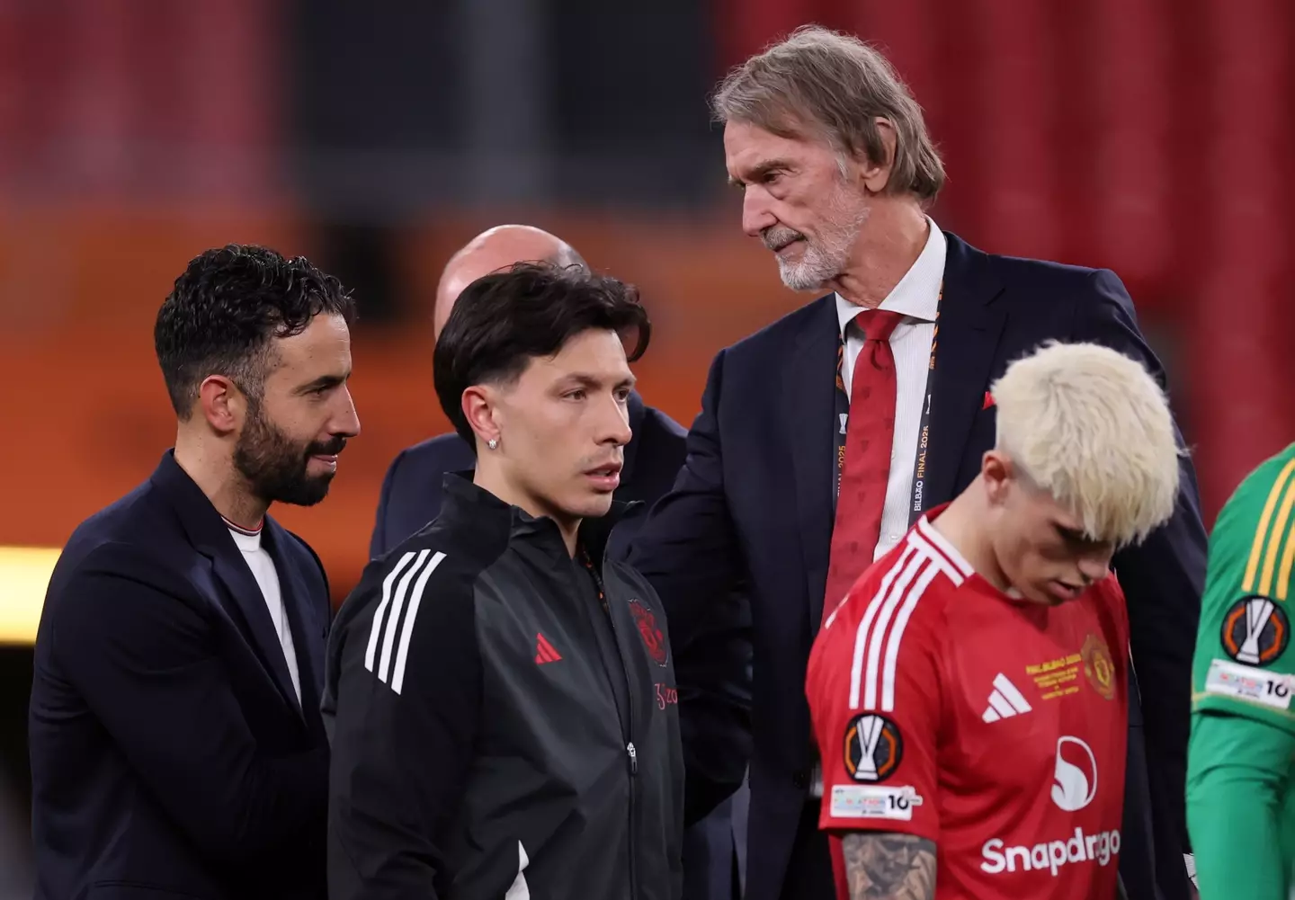 Sir Jim Ratcliffe cuts a frustrated figure during the Europa League medal ceremony. Image: Getty