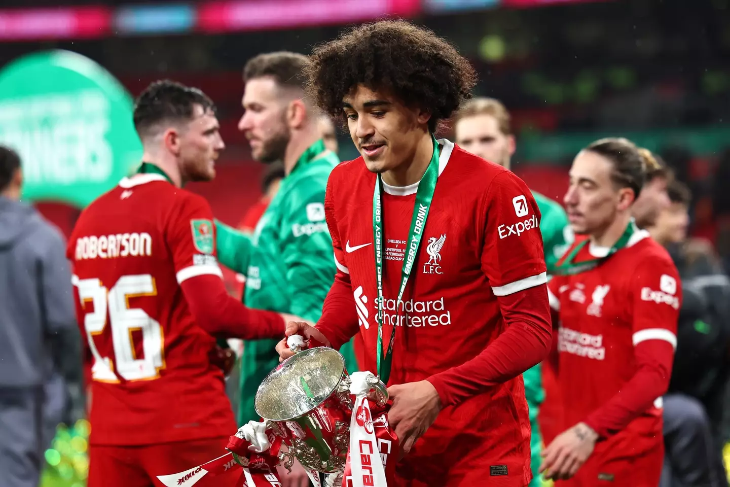 Jayden Danns holding the Carabao Cup trophy after featuring against Chelsea.