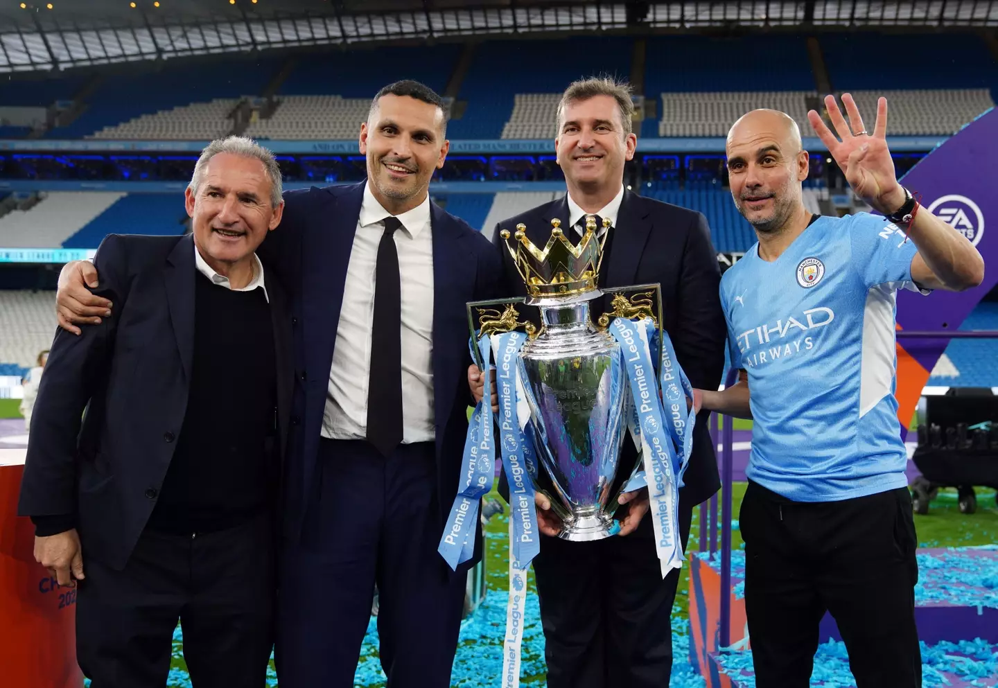 Pep Guardiola with Man City chiefs following their Premier League triumph. Image: Alamy