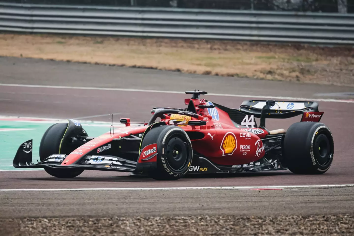 Lewis Hamilton drives the Ferrari SF-23 around the Fiorano test track in Maranello (Image: Getty)