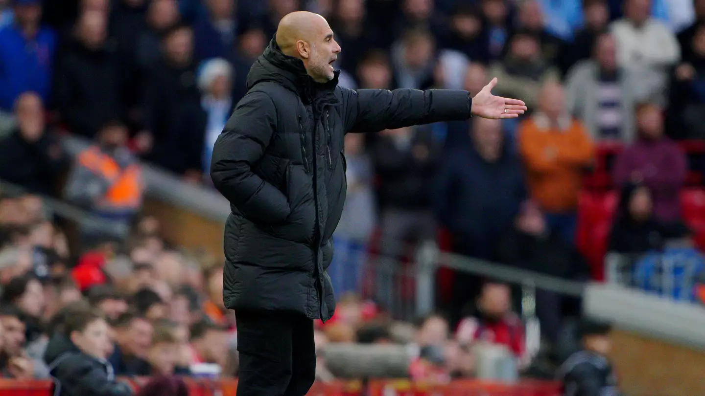 Manchester City manager Pep Guardiola on the sideline during the Premier League match at Anfield (PA Images/Alamy)