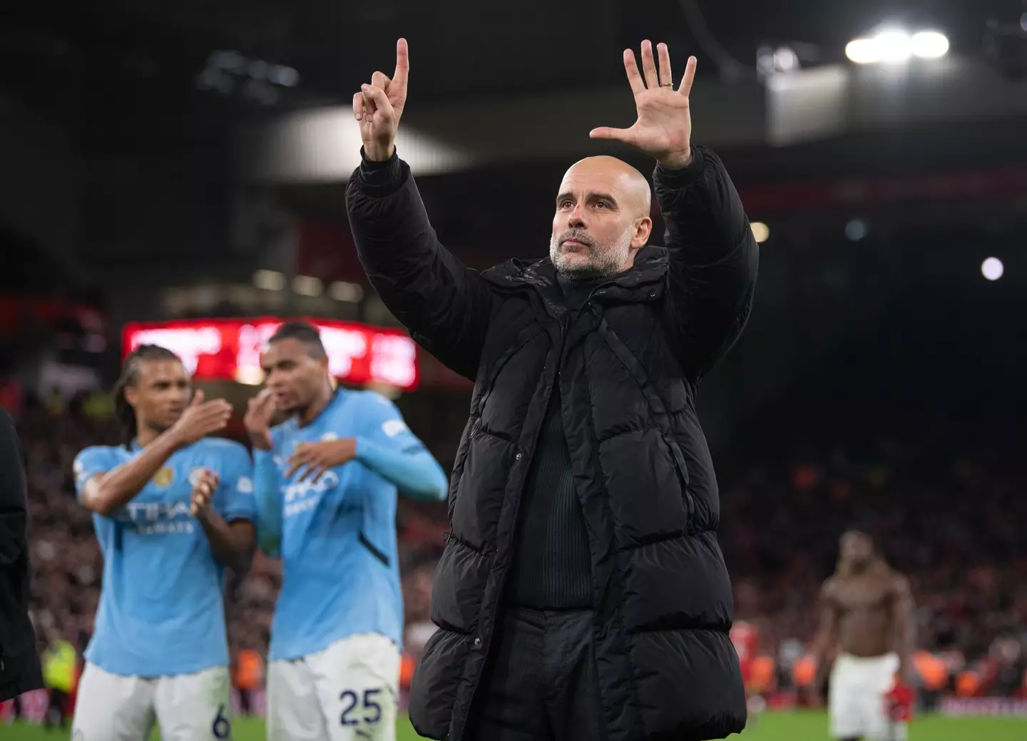 Pep Guardiola holds up six fingers to reference how many Premier Leagues he has won. Image: Getty