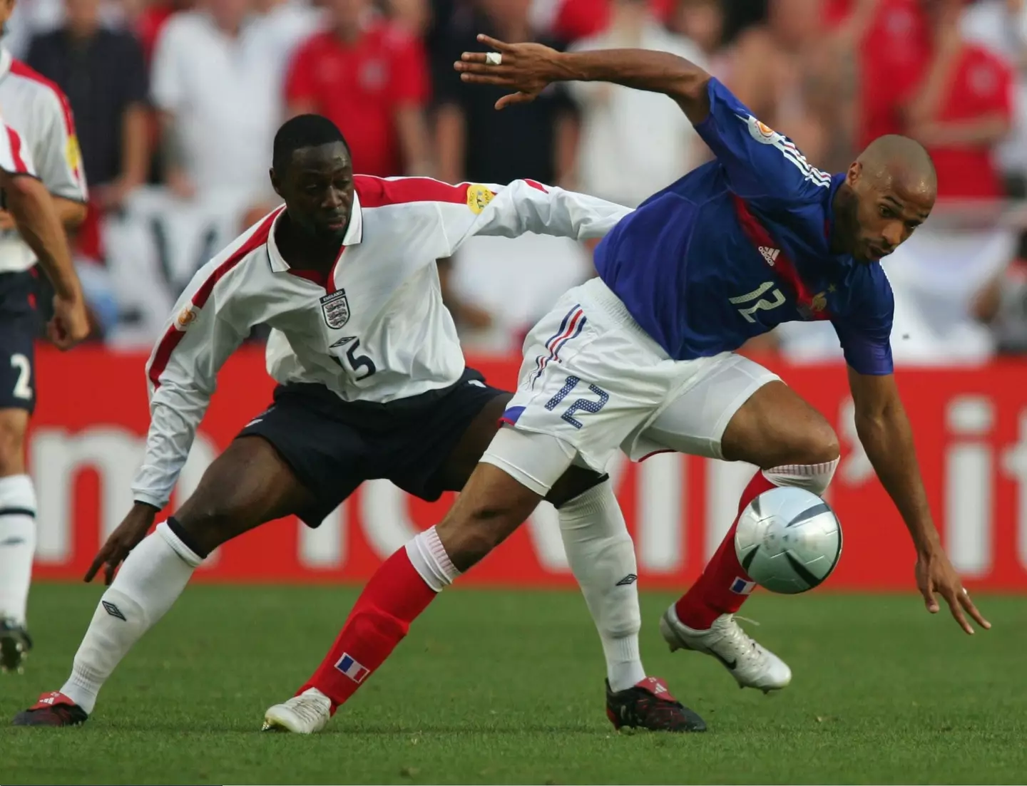 Thierry Henry and Ledley King facing off for France and England (credit: getty)