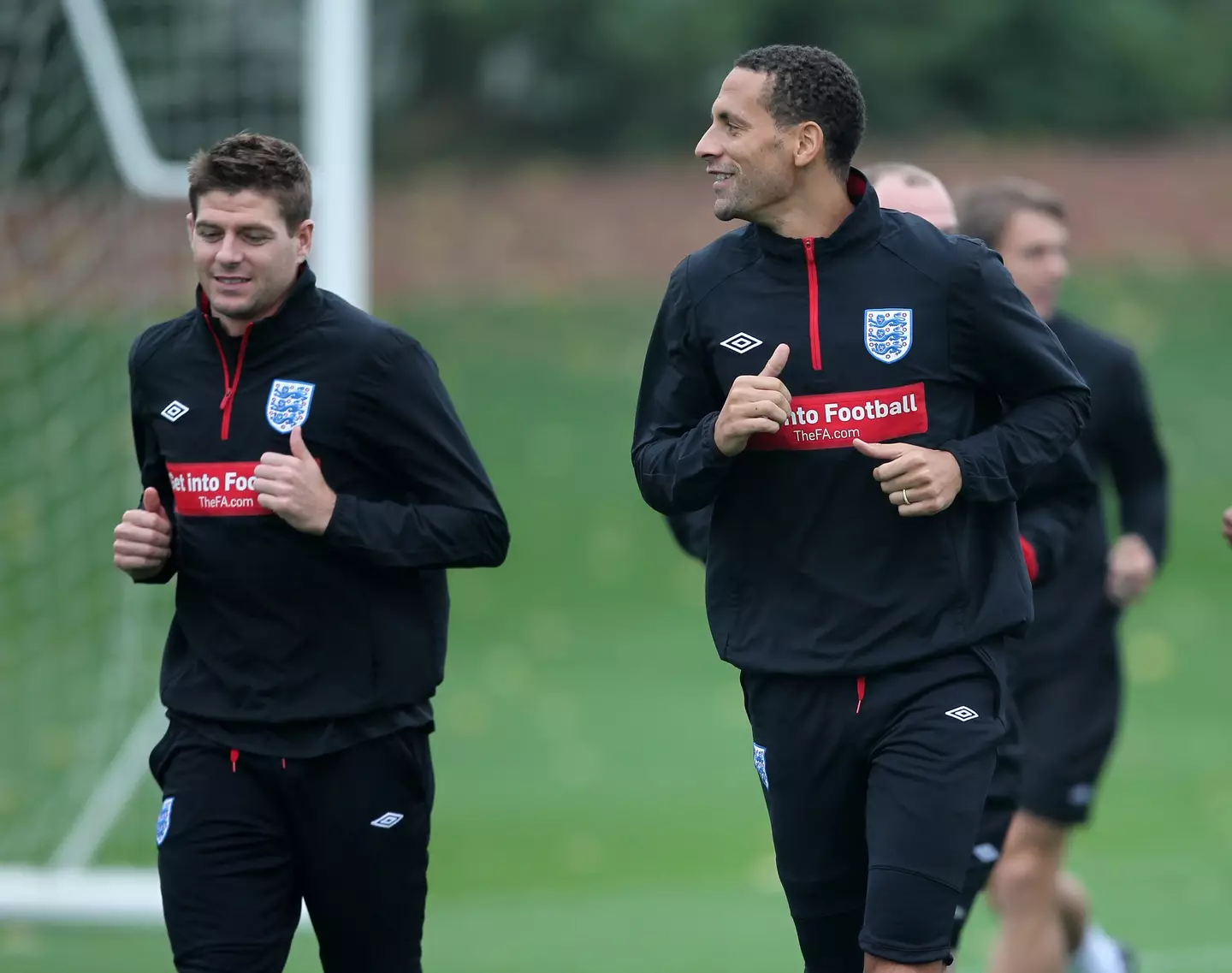 Gerrard and Ferdinand were rivals at club level but teammates for England. Image: Alamy