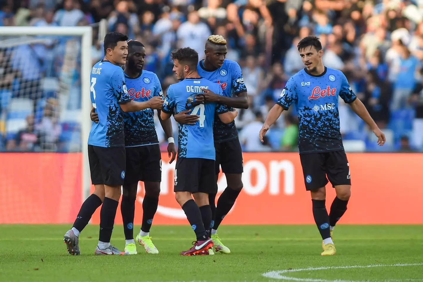 Victor Osimhen celebrates a Napoli goal with team-mates (