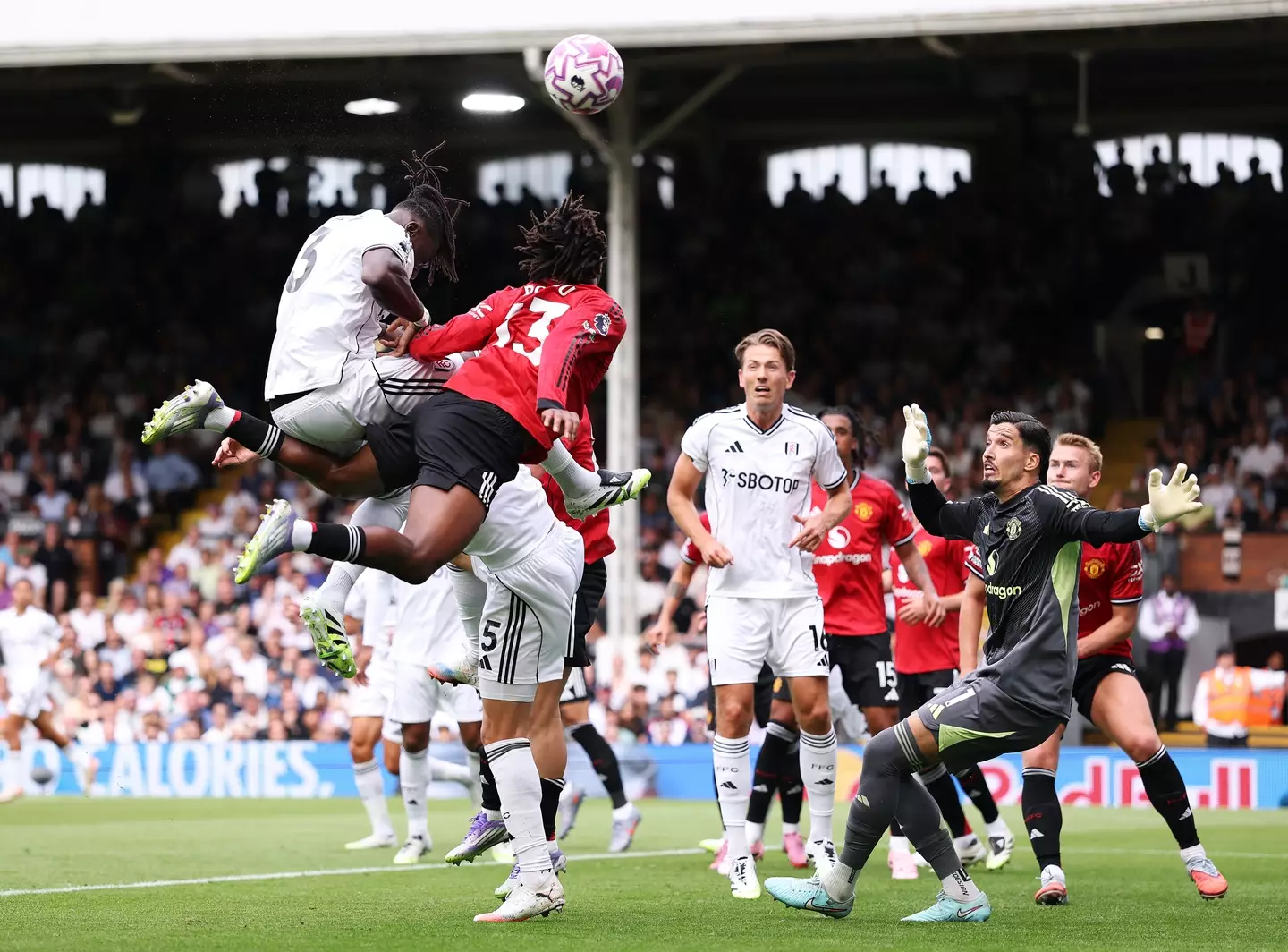 Calvin Bassey had to go off briefly against Manchester United. Image: Getty