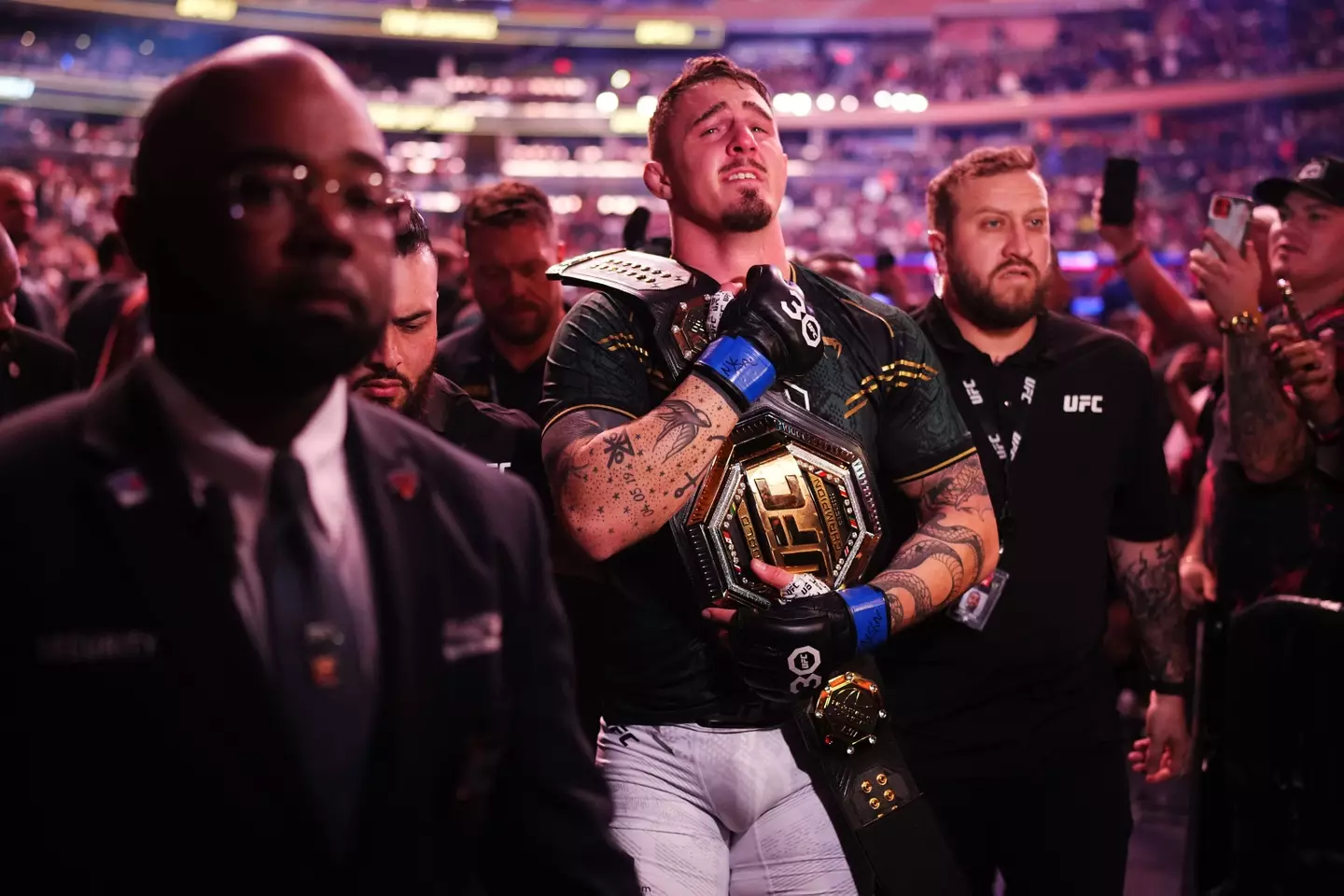 Tom Aspinall with the interim UFC heavyweight title after his win at UFC 295. Image: Getty