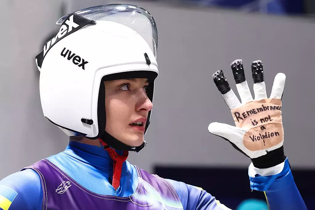Olena Smaha shows the message on her hand (Credit:Getty)