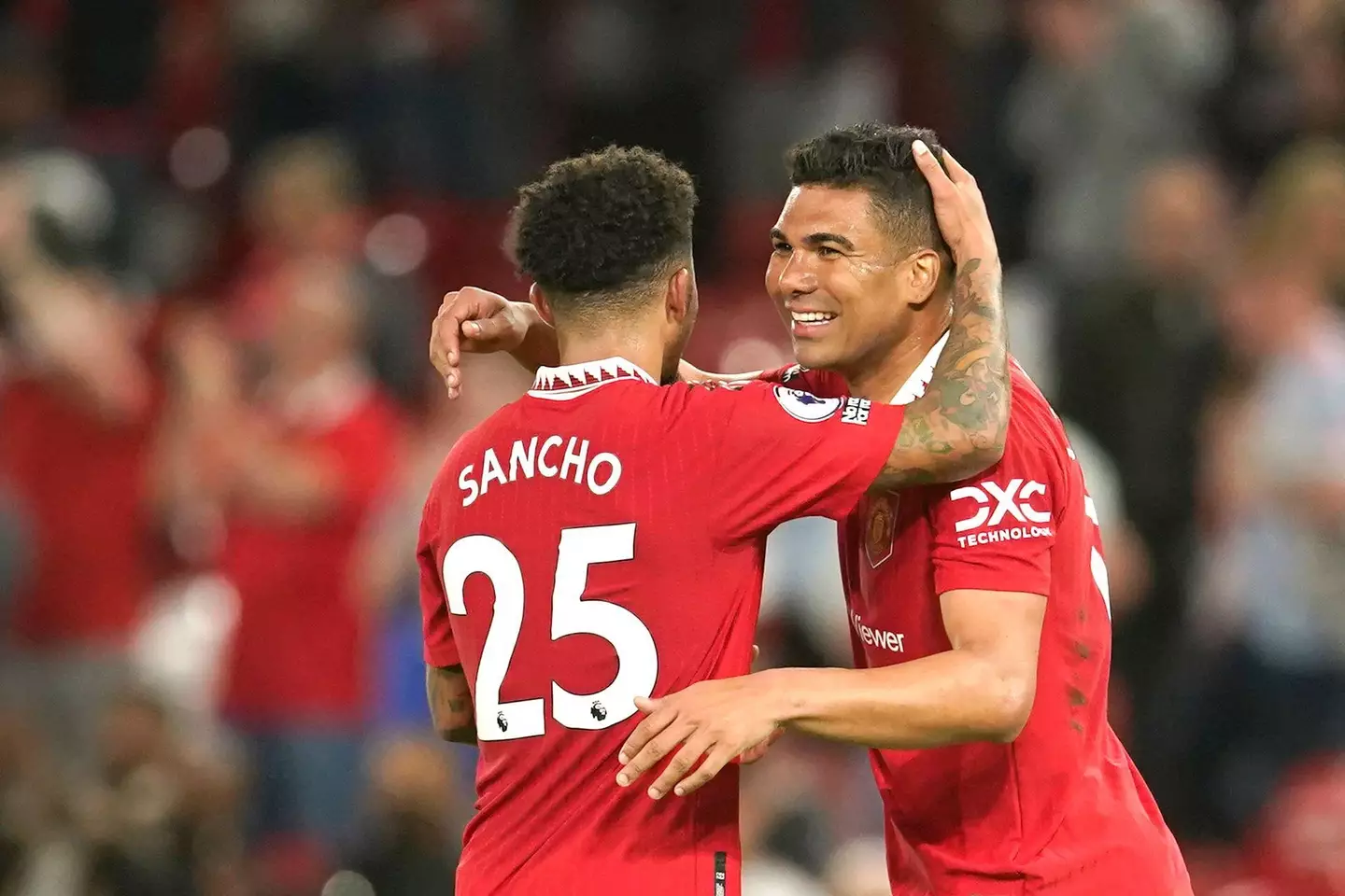 Casemiro celebrates with Jadon Sancho. Image: Alamy