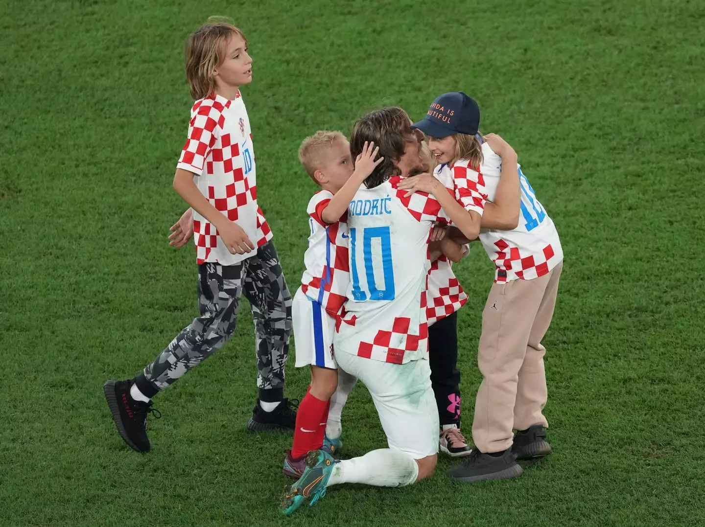 Modric celebrates winning the quarter-final against Brazil with his family. Image: Alamy