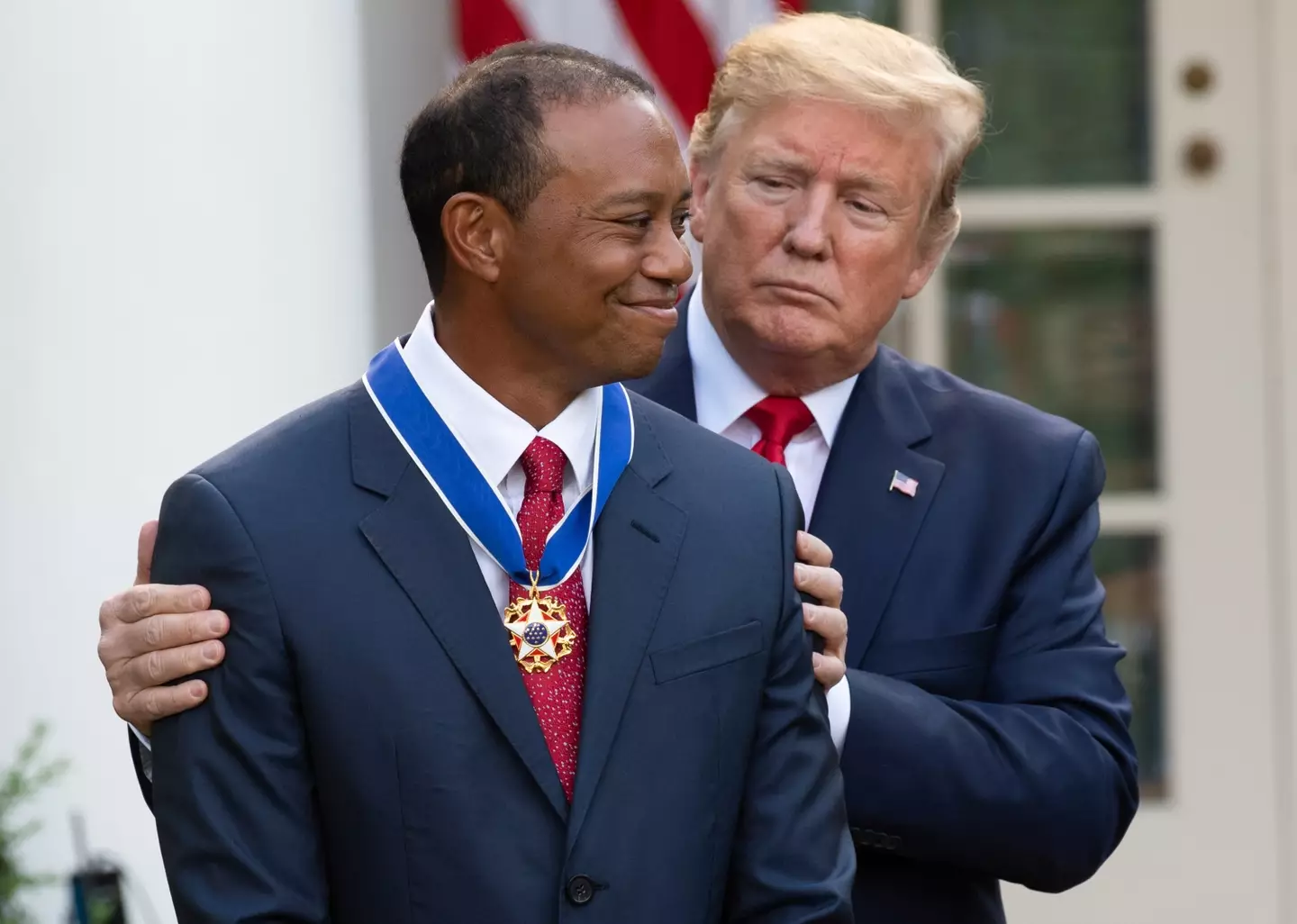Donald Trump with Tiger Woods- Getty