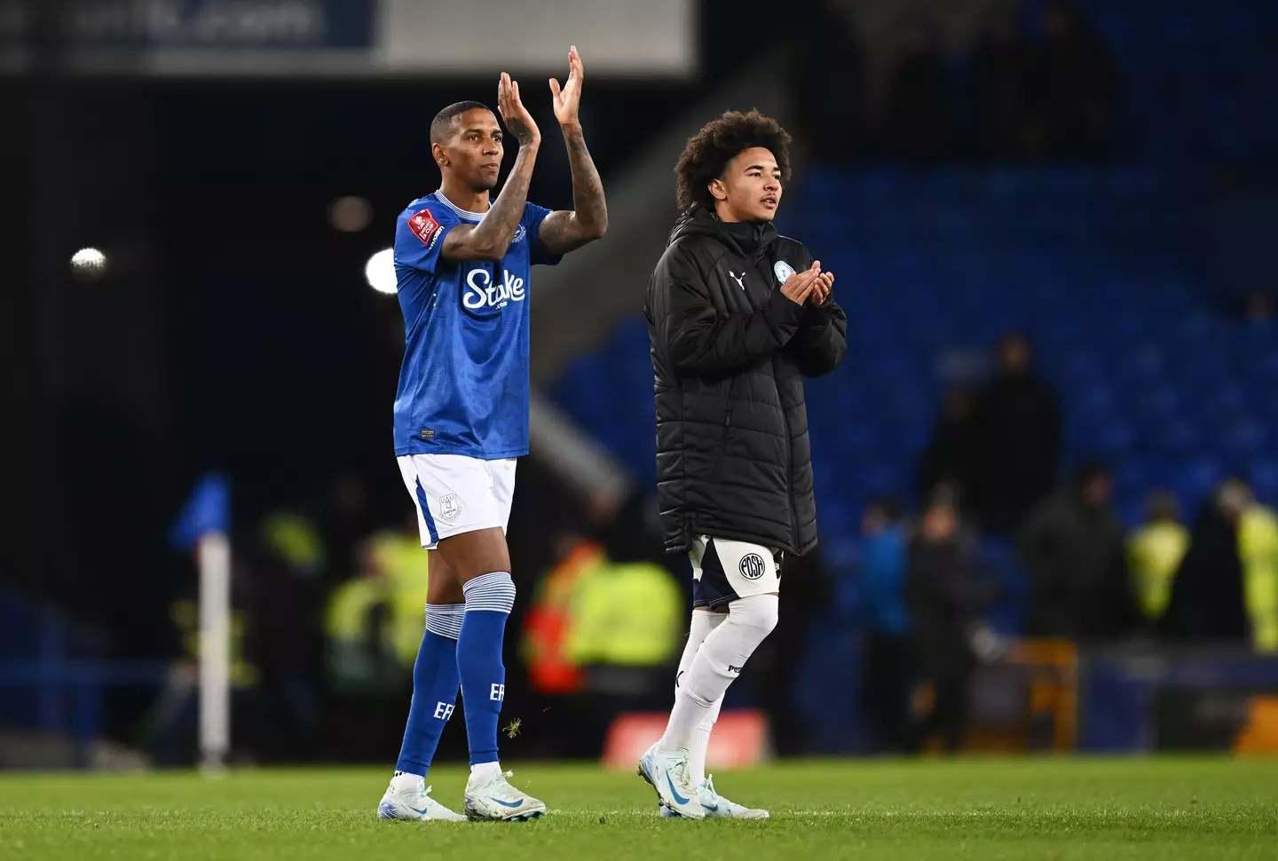 Ashley and Tyler Young applaud fans after the FA Cup game. Image: Getty