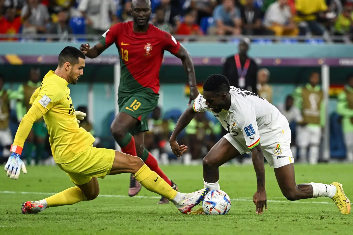 Diogo Costa and Inaki Williams duel for the ball. Image: Alamy