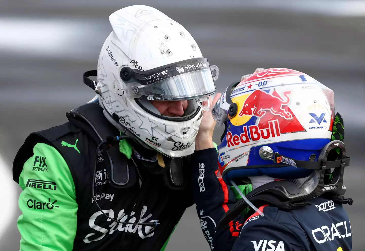 Nico Hulkenberg is congratulated by Max Verstappen after finishing third at the British Grand Prix. (Image: Getty)
