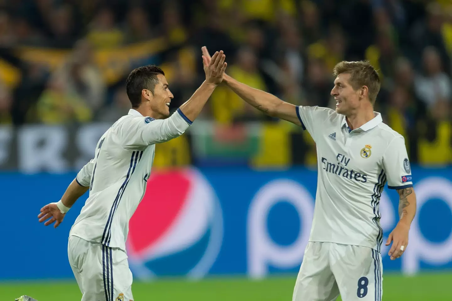 Cristiano Ronaldo and Toni Kroos celebrate a Real Madrid goal. Image: Getty