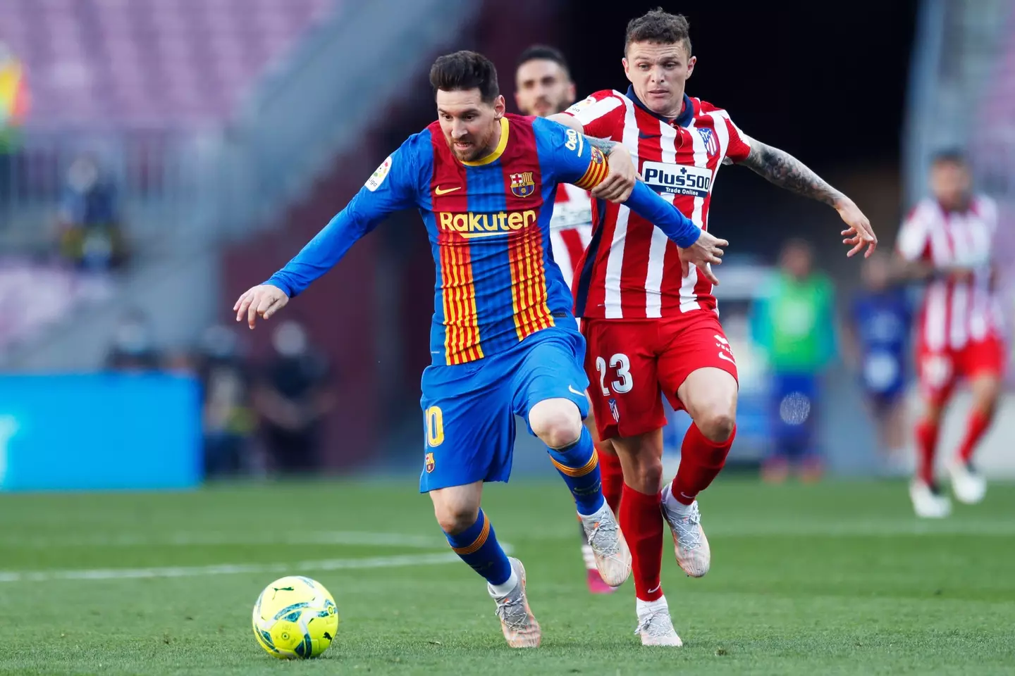 Trippier attempts to tackle Messi in 2021. (Image