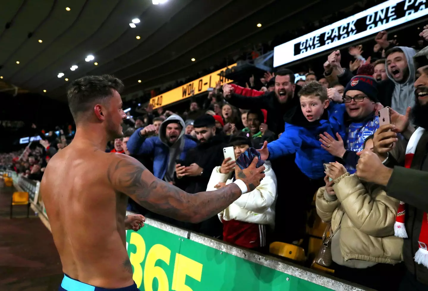 Ben White gives his shirt to a very surprised looking young Arsenal fan. Image: PA Images