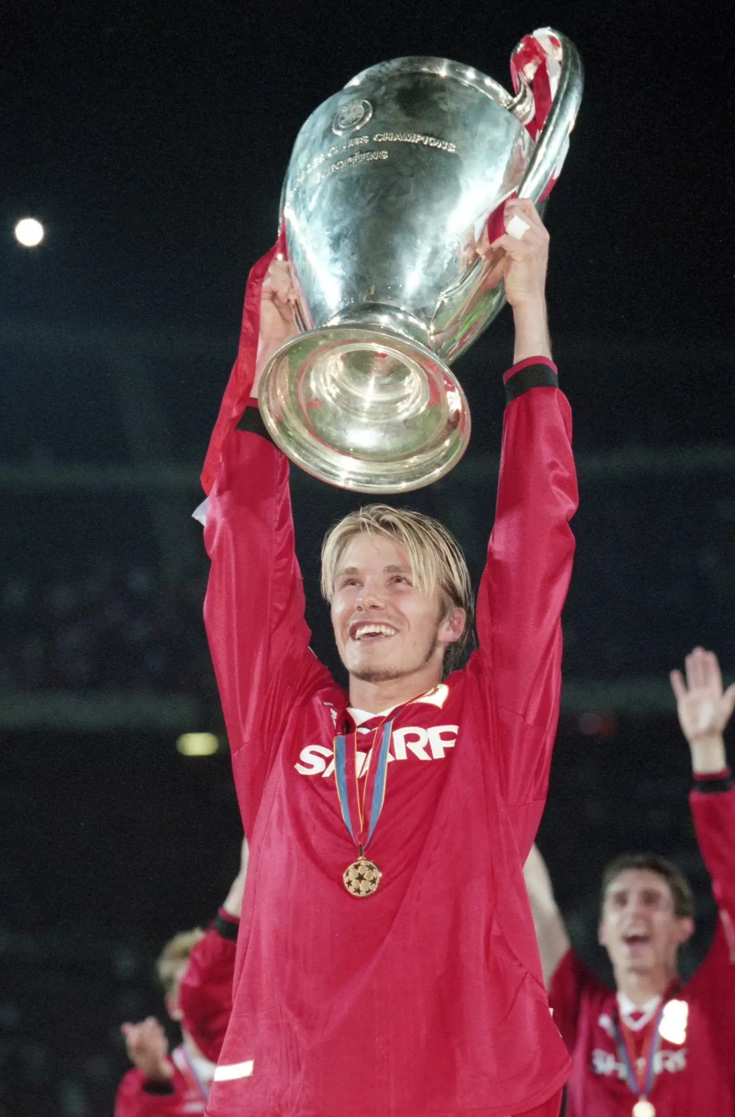 David Beckham with the Champions League trophy in 1999. (Alamy)