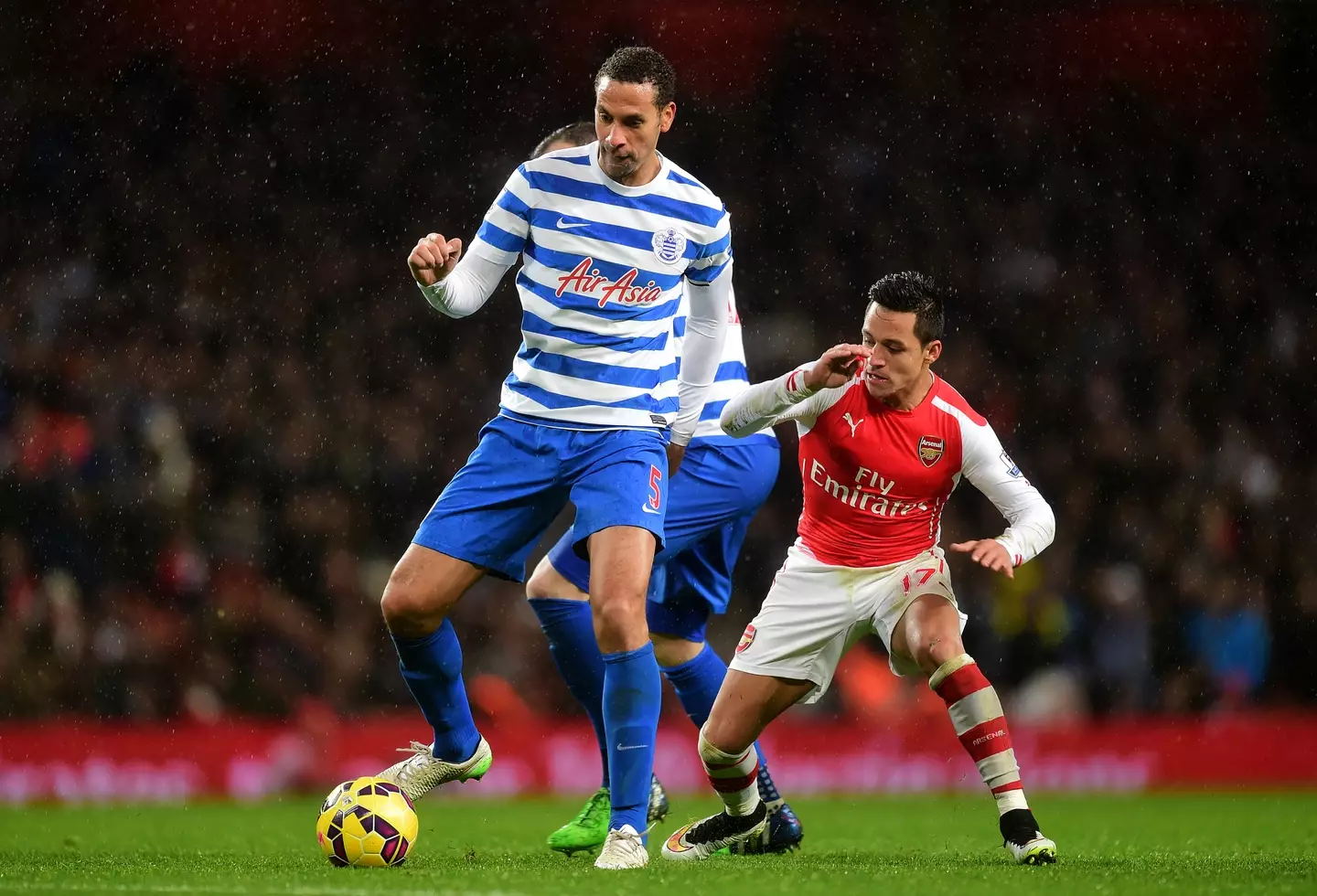 Ferdinand in action against Arsenal for QPR