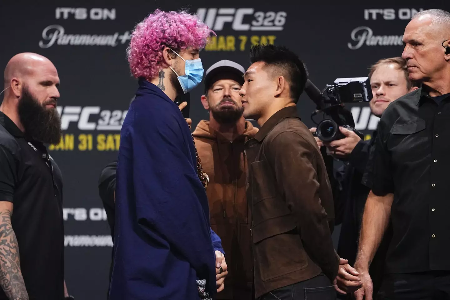Sean O'Malley wore a face mask when he faced off against Song Yadong. Image: Getty