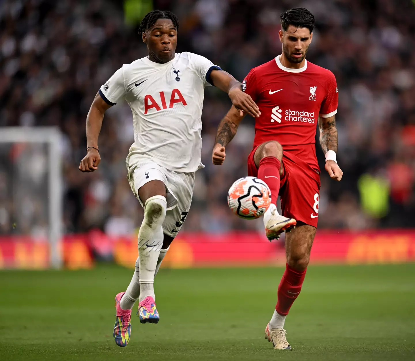 Spurs defender Destiny Udogie in action against Liverpool. (