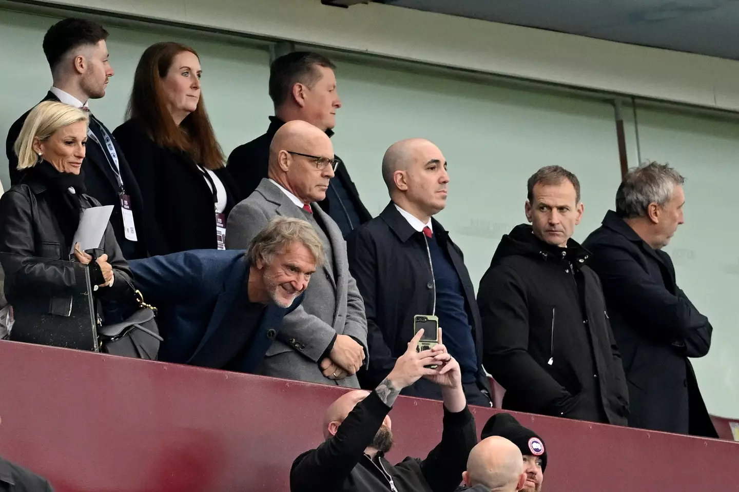 Sir Jim Ratcliffe poses for a photo as Dan Ashworth looks on. Image credit: Getty